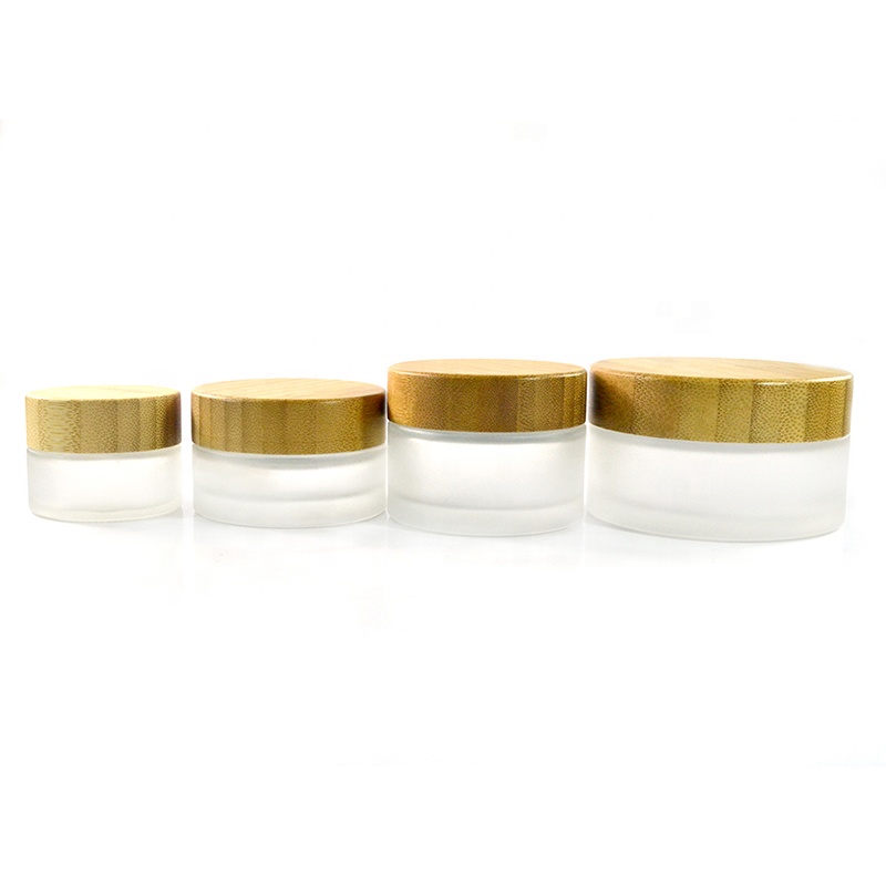 Wholesale cosmetic facial mask 1oz 5g 15g 30g 50g 100g frosted glass cream jar with bamboo wooden lid