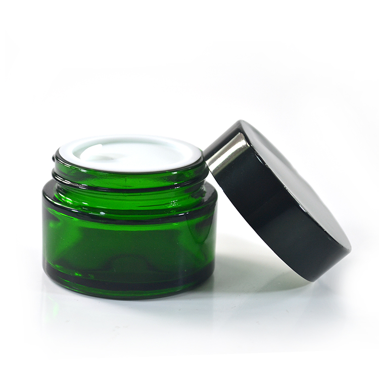 Wholesale cosmetic jars  face cream packaging 20g green glass cream jar with black anodized aluminum lid