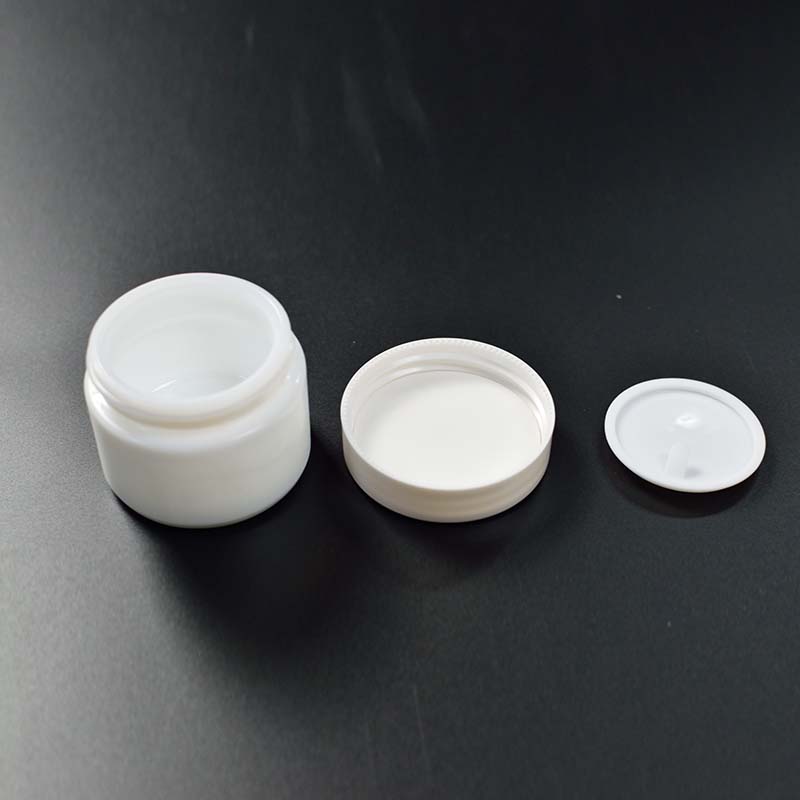 Wholesale cosmetic packaging white glass bottle