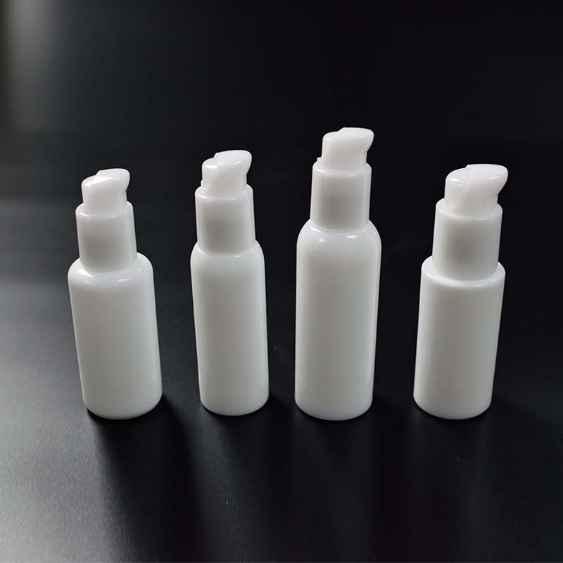 Wholesale cosmetic packaging white glass bottle