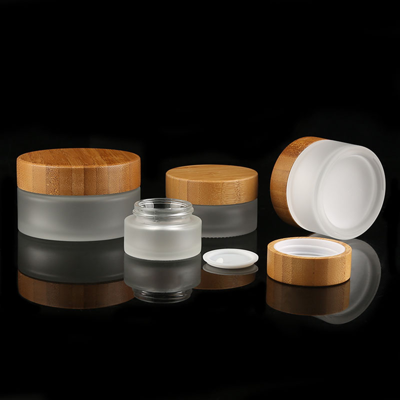 Wholesale cream jar 5g 15g 30g 50g 100g 150g empty container cosmetic packing frosted glass jar with bamboo lid