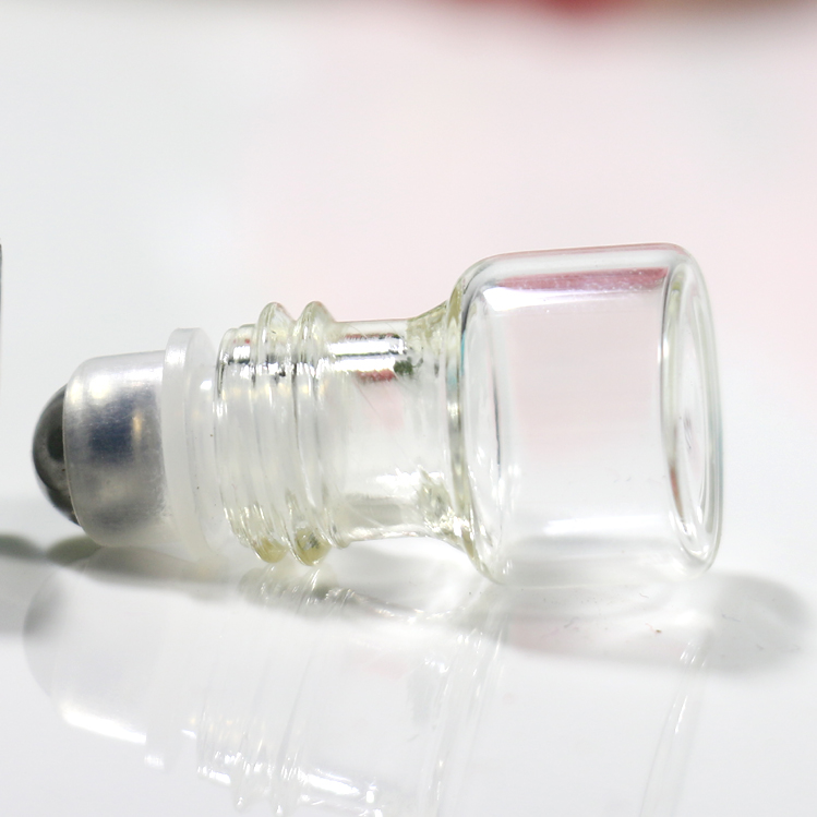 Wholesale custom 1ML cosmetic essential oil transparent glass ball bottle