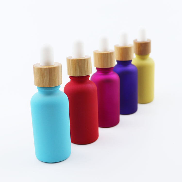 Wholesale custom color 30ml glass serum dropper bottle bamboo cap tincture bottle for cosmetic packaging