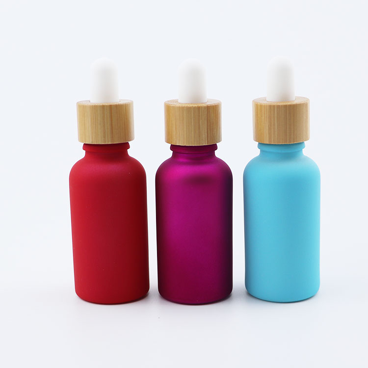 Wholesale custom color 30ml glass serum dropper bottle bamboo cap tincture bottle for cosmetic packaging