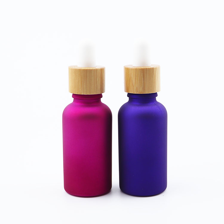 Wholesale custom color 30ml glass serum dropper bottle bamboo cap tincture bottle for cosmetic packaging