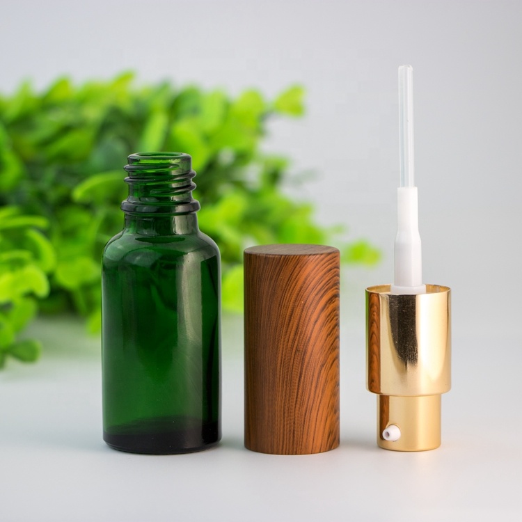 Wholesale custom eco-friendly bamboo lid green blue transparent amber glass spray bottle for skin care