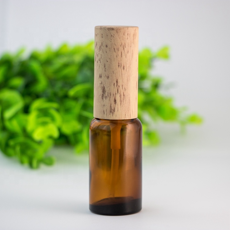 Wholesale custom eco-friendly bamboo lid green blue transparent amber glass spray bottle for skin care