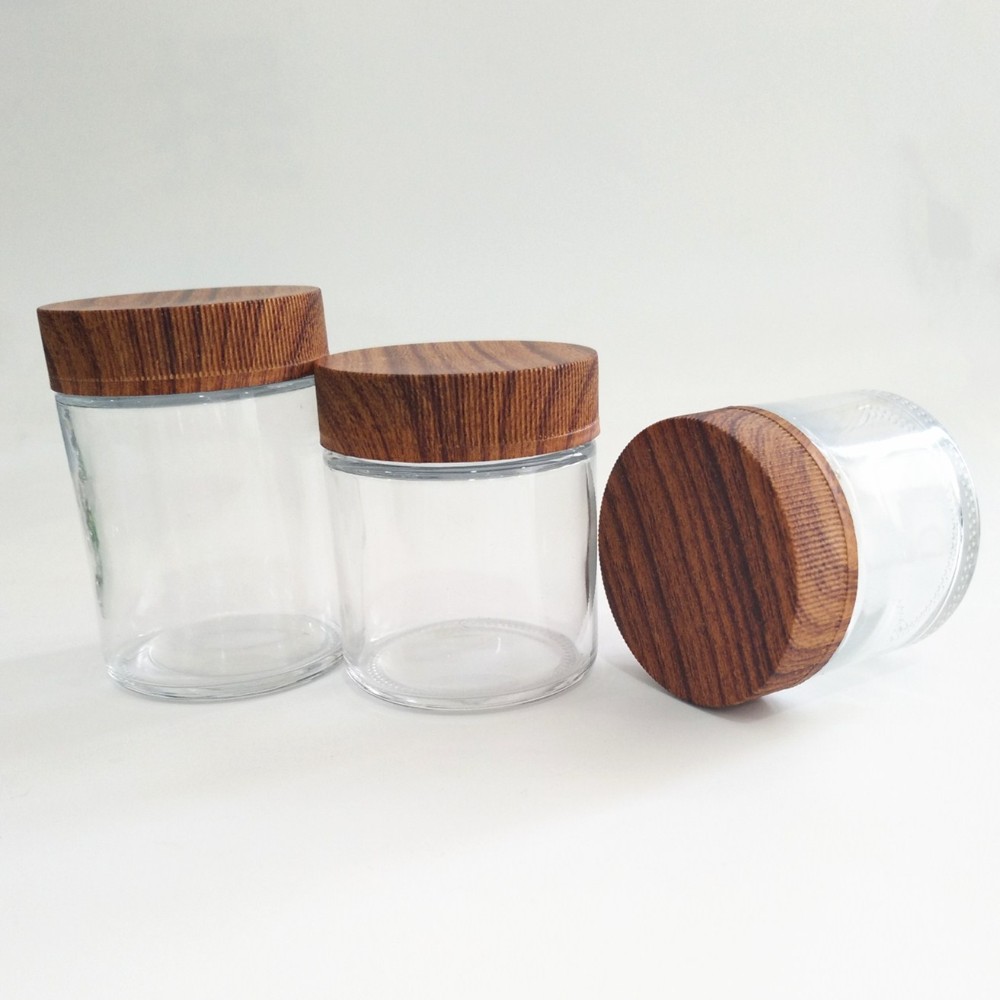 Wholesale custom printing medicine clear round glass jar for herbs skin cream bottle with black matte or smooth screw lid CR lid