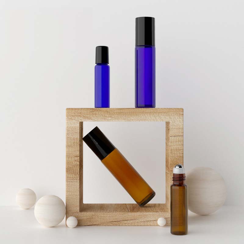 Wholesale custom roll on glass bottle 5ml 10ml amber eye roller bottle packaging with stainless roller