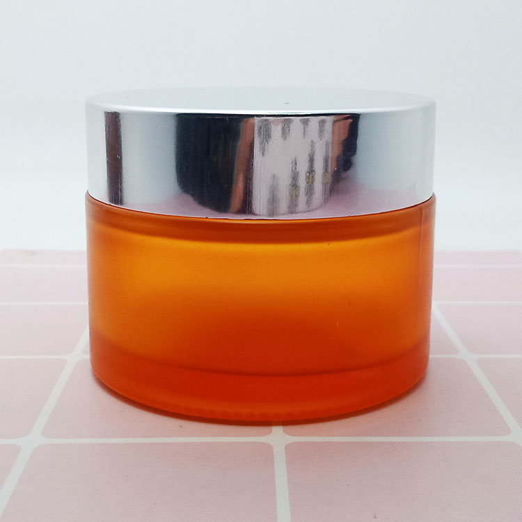Wholesale customized 50g glass jar and plastic cosmetic jar