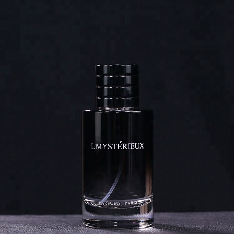 Wholesale customized cylinder 100ml black glass perfume bottle with cap