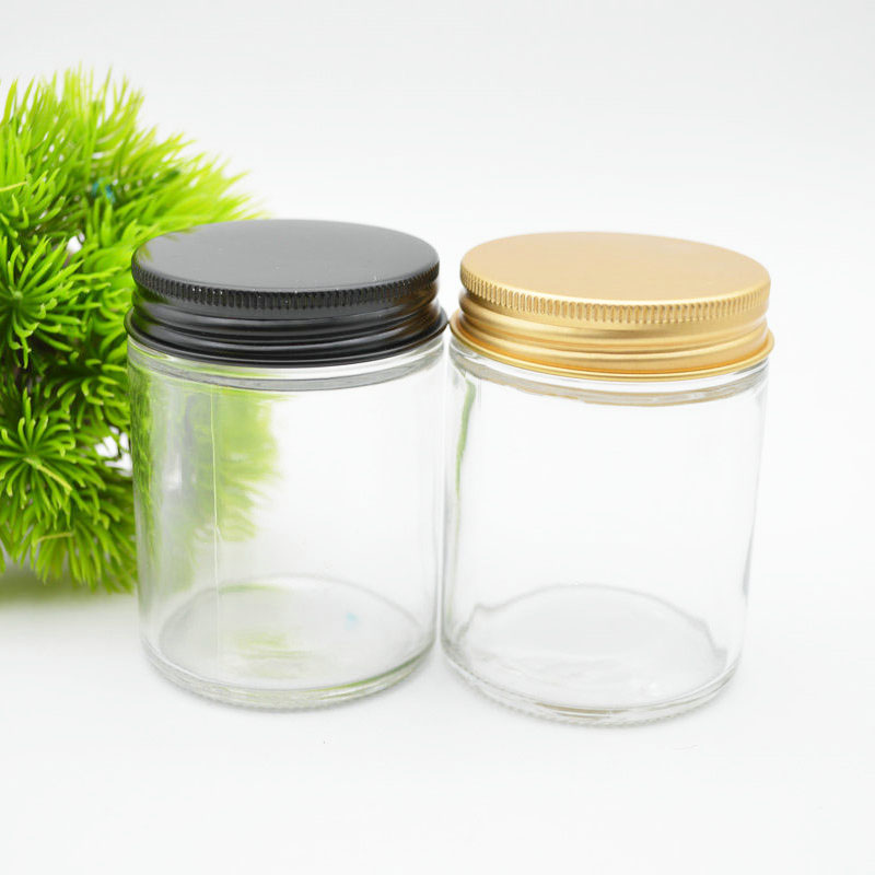 Wholesale customized high quality small round straight sided clear glass jars with aluminium screw lid