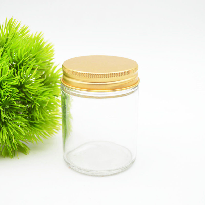 Wholesale customized high quality small round straight sided clear glass jars with aluminium screw lid