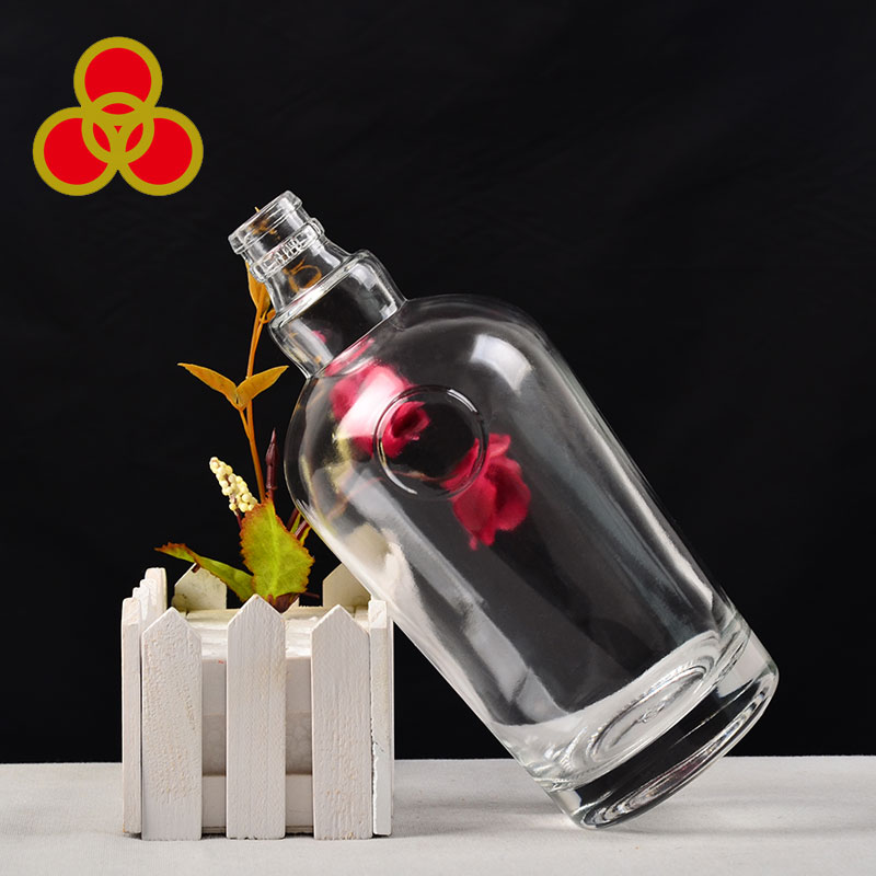 Wholesale customized logo design glass liquor bottle