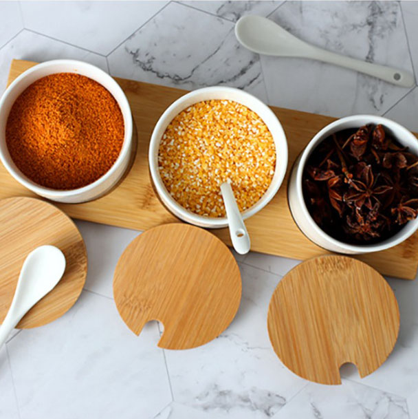 Wholesale customized spice container sets condiment pots kitchen ceramic seasoning jars with lid spoon and tray