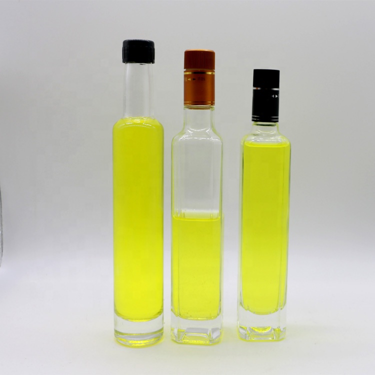 Wholesale dark green round essential oil bottle malaysia dark green oil nozzle olive oil bottle