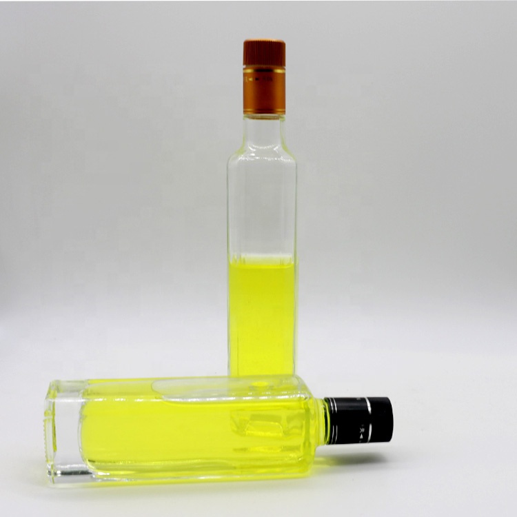 Wholesale dark green round essential oil bottle malaysia dark green oil nozzle olive oil bottle