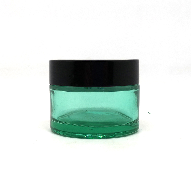 Wholesale emballage cosmtique 50g green glass jar cosmetic with silver cap