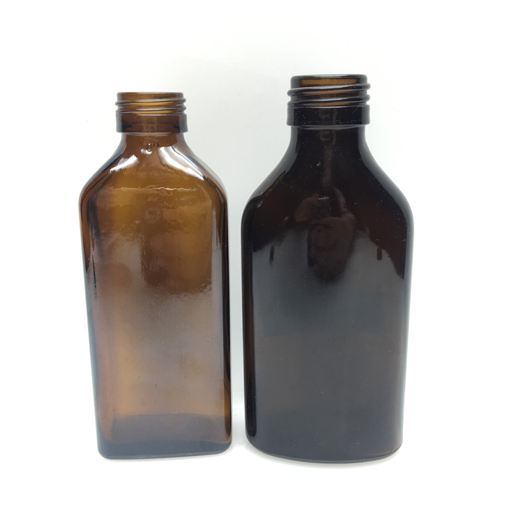 Wholesale empty 100ml pharmaceutical amber glass cough syrup bottle