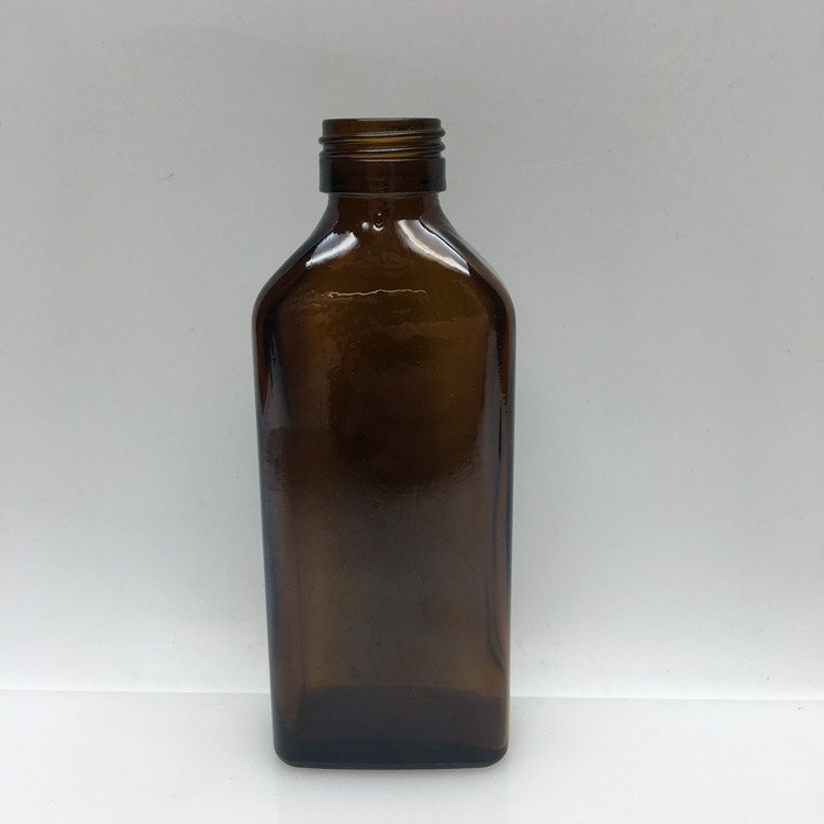 Wholesale empty 100ml pharmaceutical amber glass cough syrup bottle