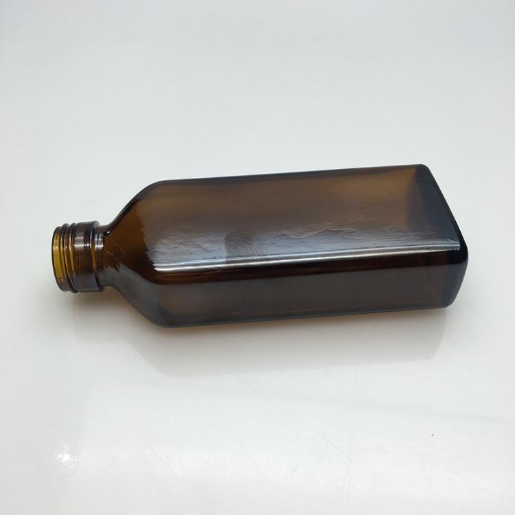 Wholesale empty 100ml pharmaceutical amber glass cough syrup bottle