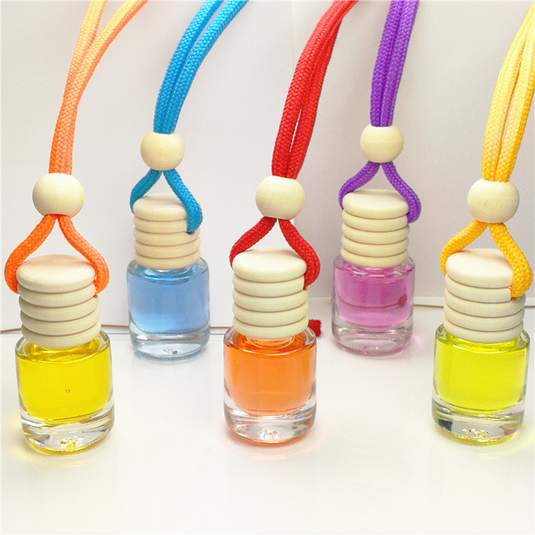Wholesale empty cylinder perfume bottle wooden cap 5ml car fragrance bottle