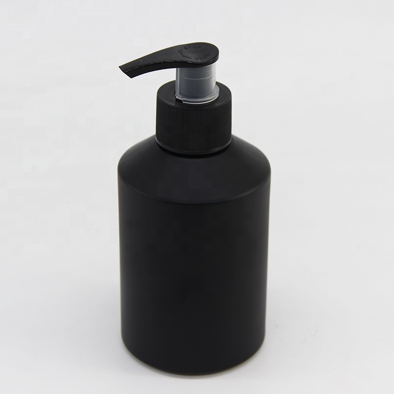 Wholesale essential oil glass bottle in 200 ml with pump head and slanted shoulder glass body