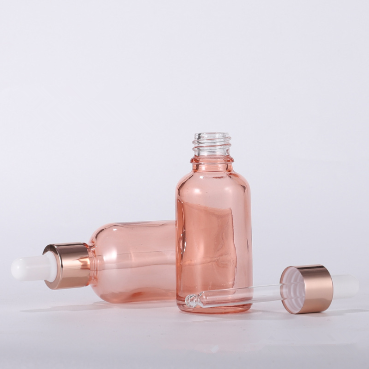 Wholesale essential oil glass bottle set 30ml 50ml 100ml Pink Rose gold Essence glass bottle with dropper