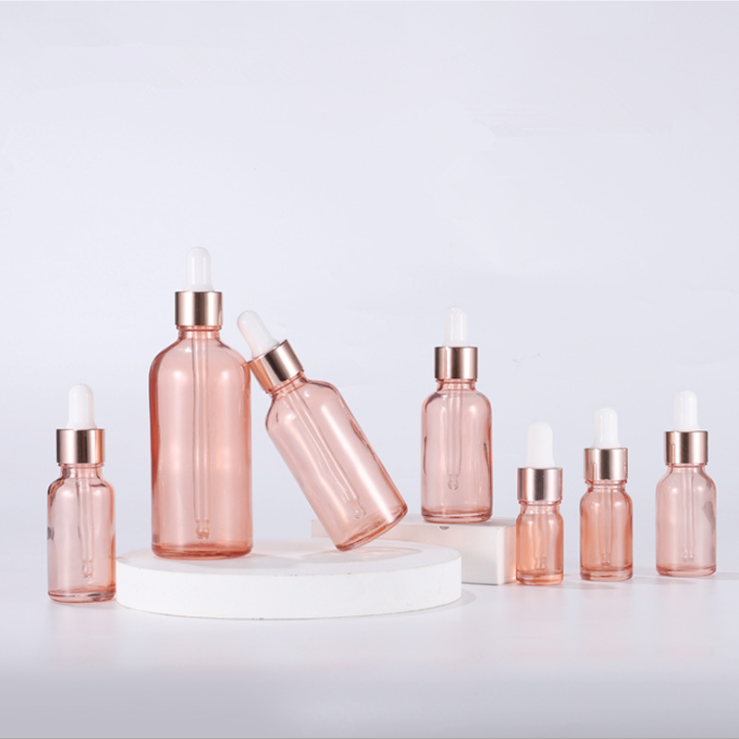 Wholesale essential oil glass bottle set 30ml 50ml 100ml Pink Rose gold Essence glass bottle with dropper