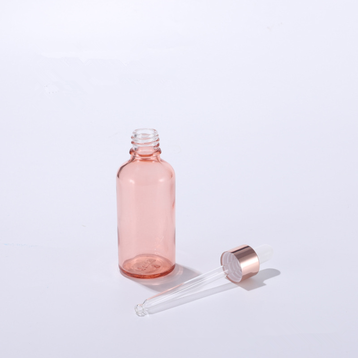 Wholesale essential oil glass bottle set 30ml 50ml 100ml Pink Rose gold Essence glass bottle with dropper