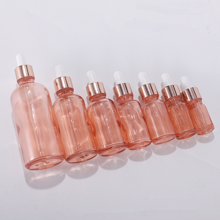 Wholesale essential oil glass bottle set 30ml 50ml 100ml Pink Rose gold Essence glass bottle with dropper