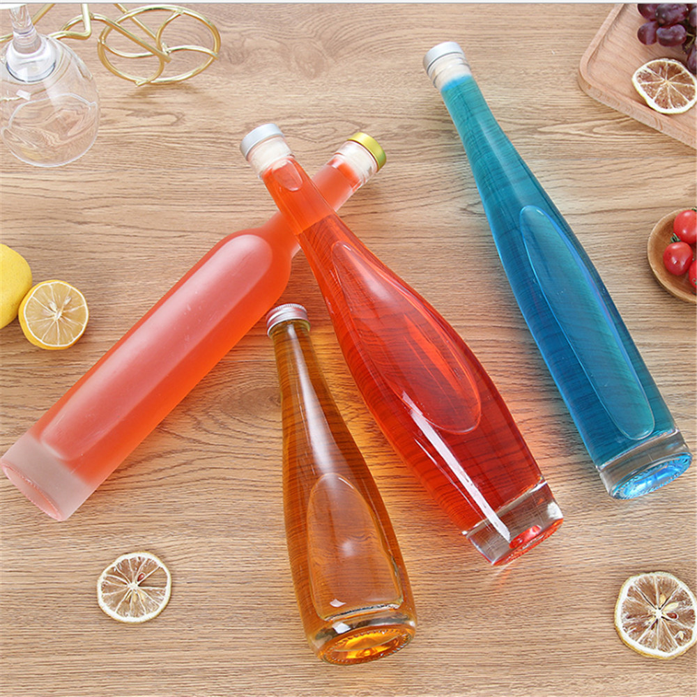 Wholesale factory custom design and logo milk juice water glass container beverage bottles