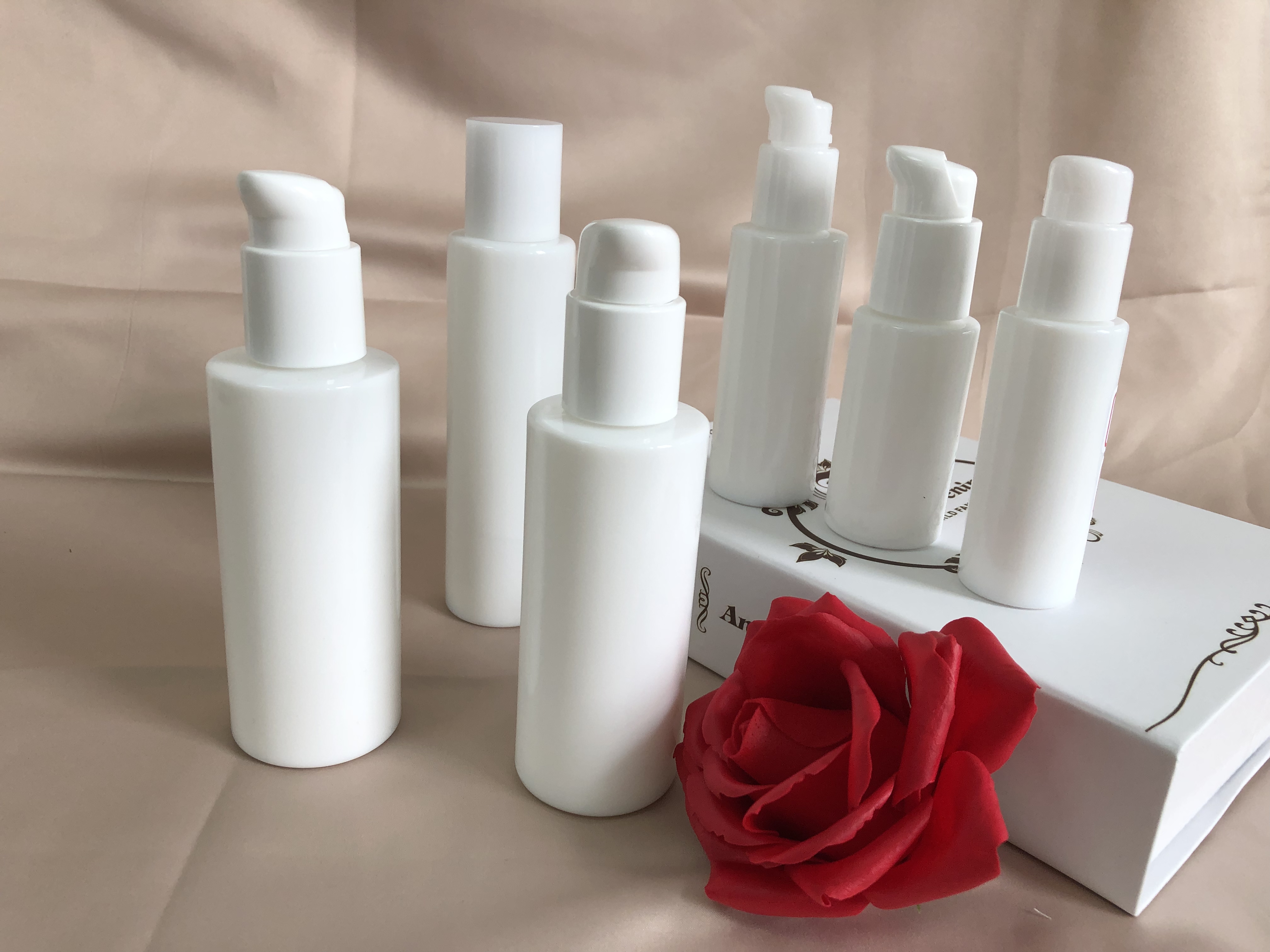 Wholesale factory price cosmetic packaging skin care opal glass bottle