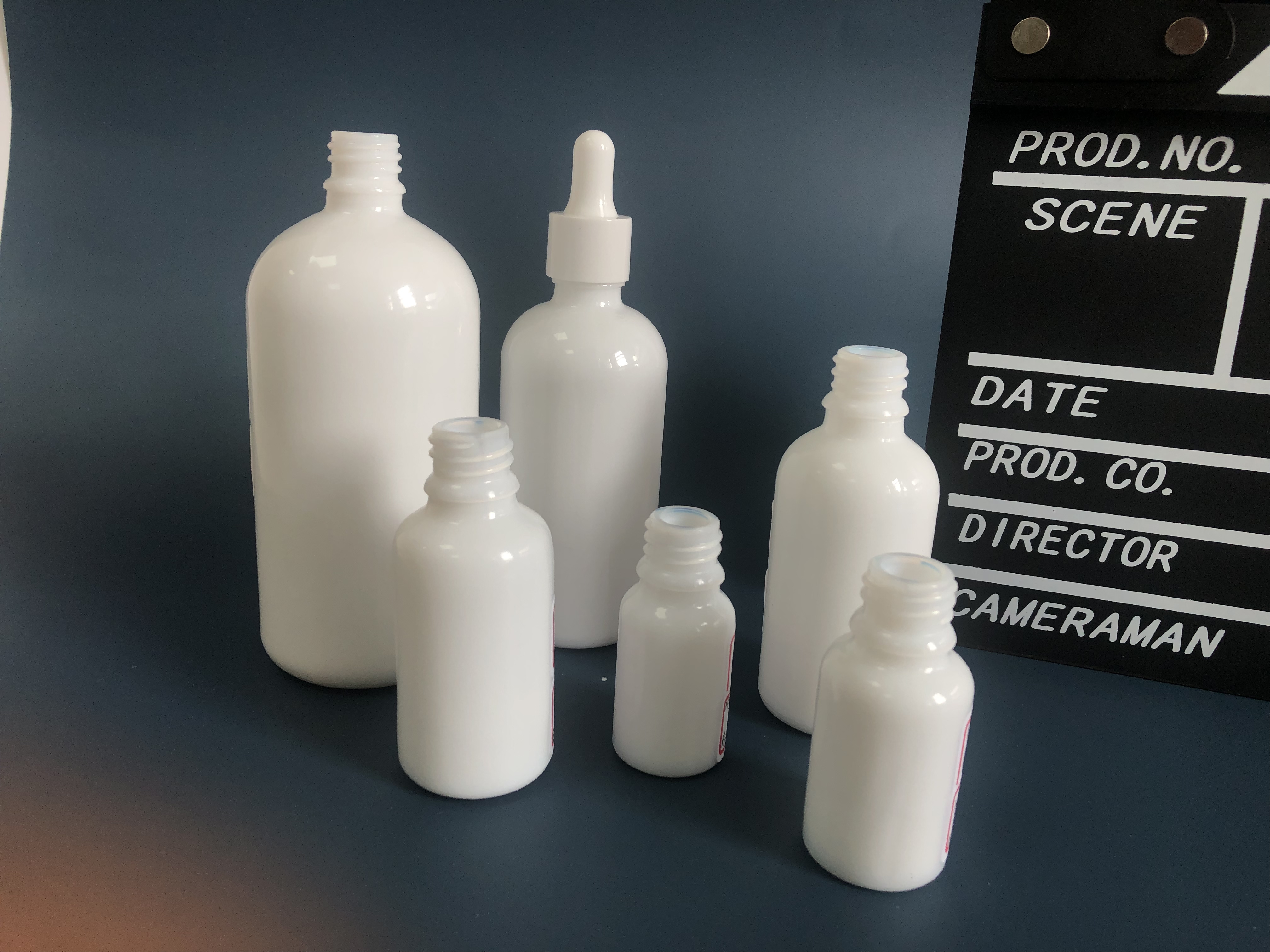 Wholesale factory price cosmetic packaging skin care opal glass bottle