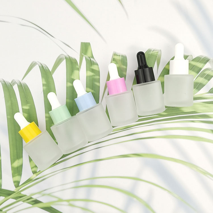 Wholesale flat shoulder bottles 20ml glass serum dropper bottle with color pipette for skin care packaging