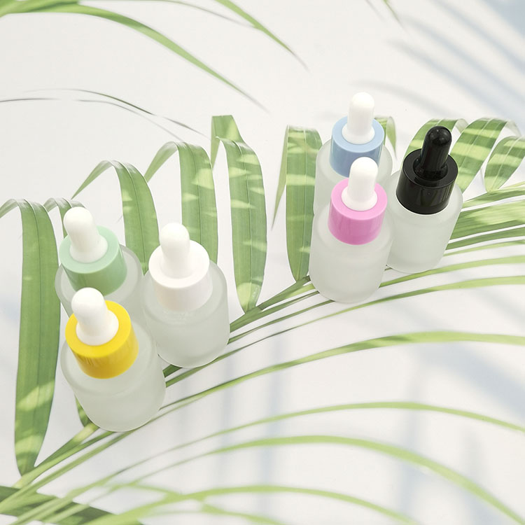 Wholesale flat shoulder bottles 20ml glass serum dropper bottle with color pipette for skin care packaging