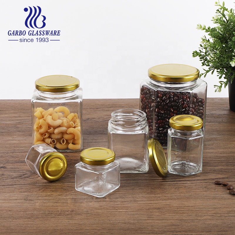 Wholesale food container hexagon glass jars with golden metal closure 50ml 70ml 100ml 300ml 500ml 750ml