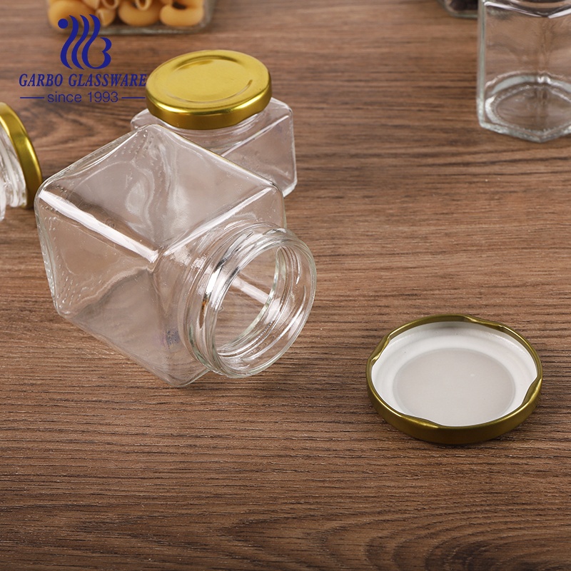 Wholesale food container hexagon glass jars with golden metal closure 50ml 70ml 100ml 300ml 500ml 750ml