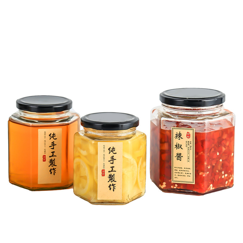 Wholesale food grade 350g hexagon honey jar glass food 250ml 8oz empty food glass storage jar with black lids