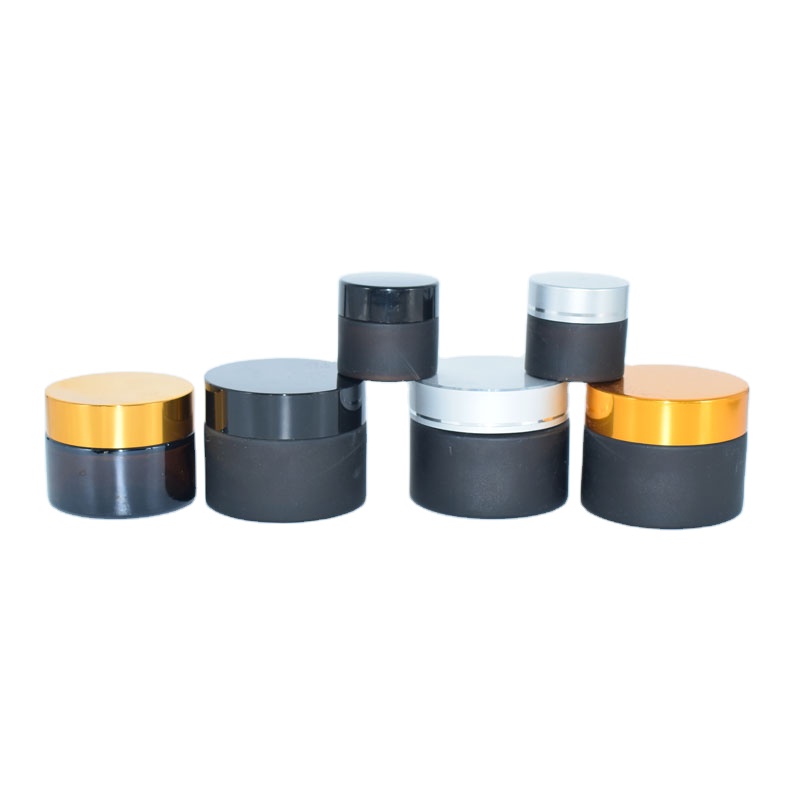 Wholesale frosted matte cosmetic cream glass jar with black cap for facial cosmetic packaging