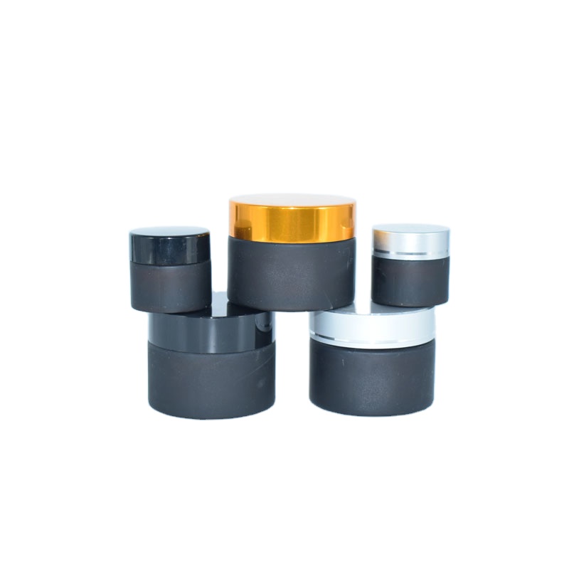 Wholesale frosted matte cosmetic cream glass jar with black cap for facial cosmetic packaging