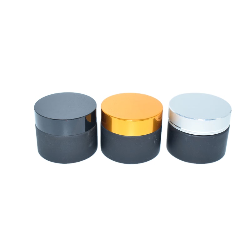 Wholesale frosted matte cosmetic cream glass jar with black cap for facial cosmetic packaging