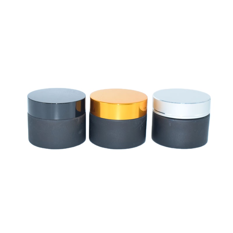 Wholesale frosted matte cosmetic cream glass jar with black cap for facial cosmetic packaging