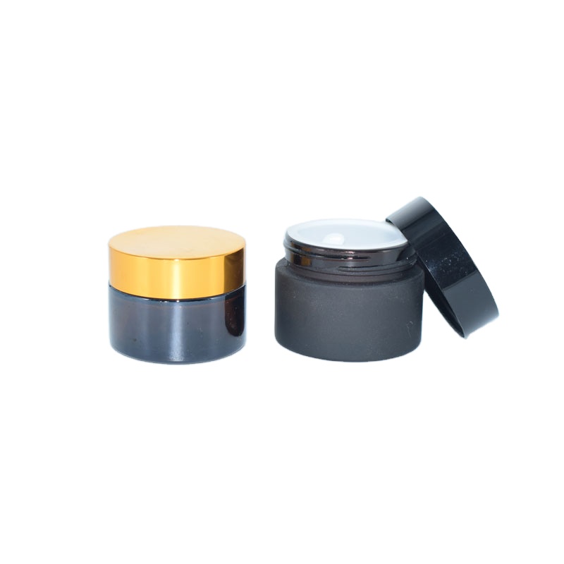 Wholesale frosted matte cosmetic cream glass jar with black cap for facial cosmetic packaging