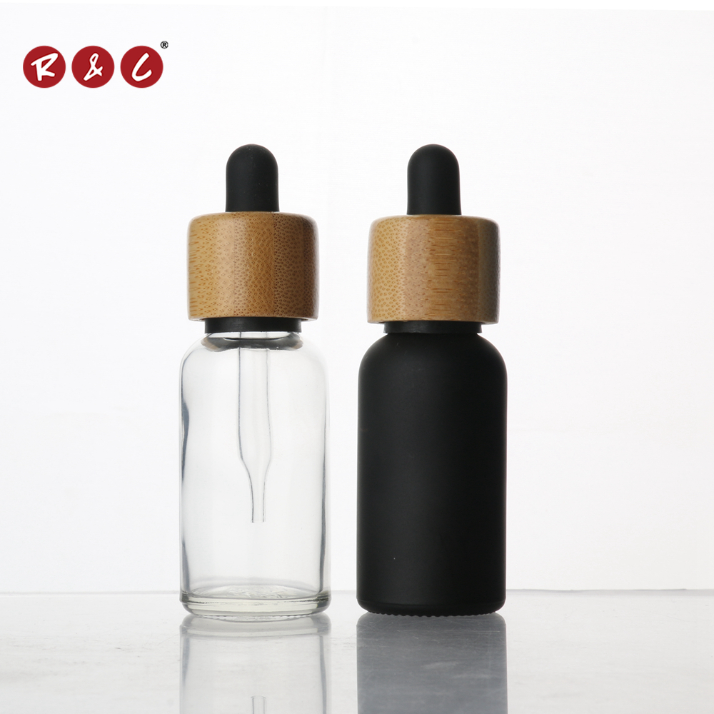 Wholesale glass Dropper Bottle essential oil bottle CBD glass bottle with bamboo lid