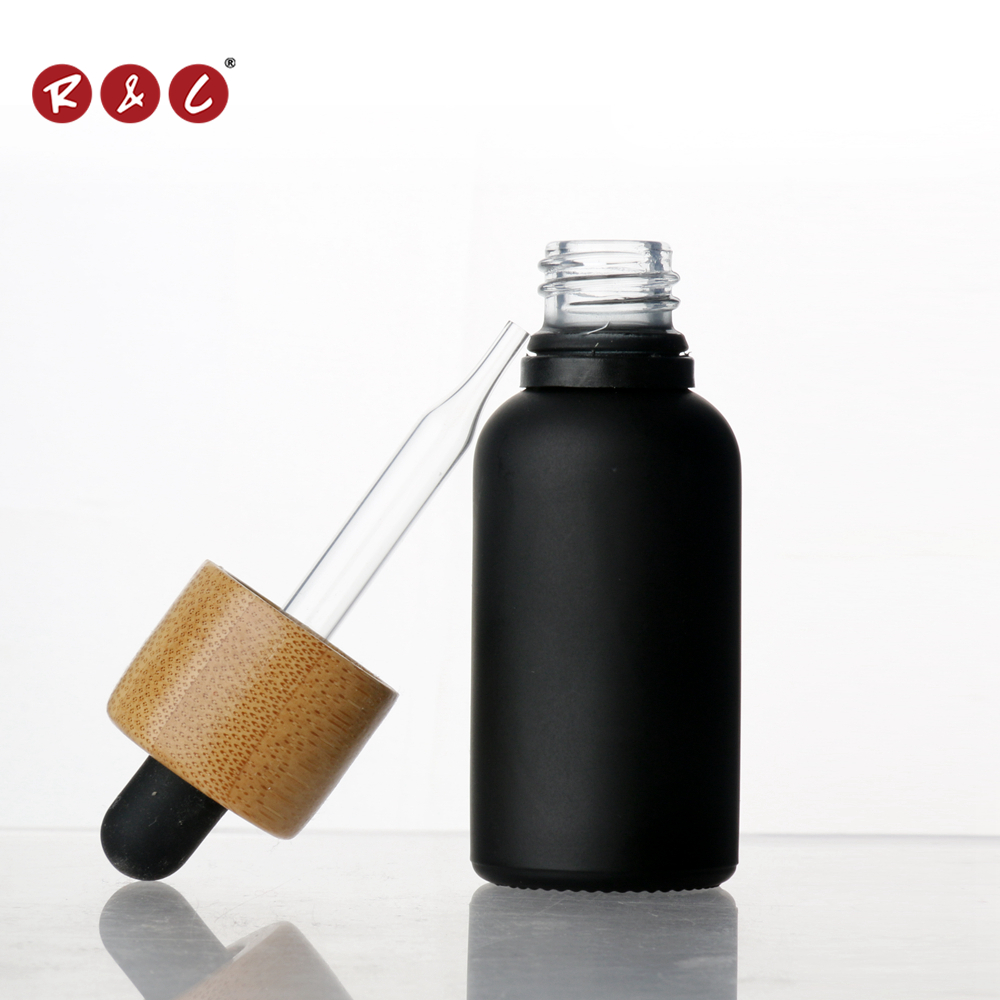 Wholesale glass Dropper Bottle essential oil bottle CBD glass bottle with bamboo lid