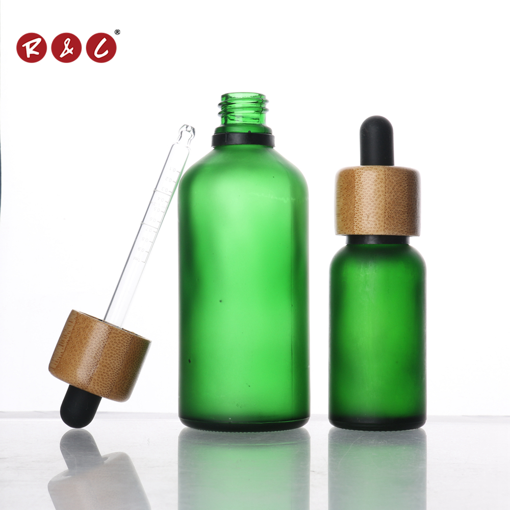 Wholesale glass Dropper Bottle essential oil bottle CBD glass bottle with bamboo lid