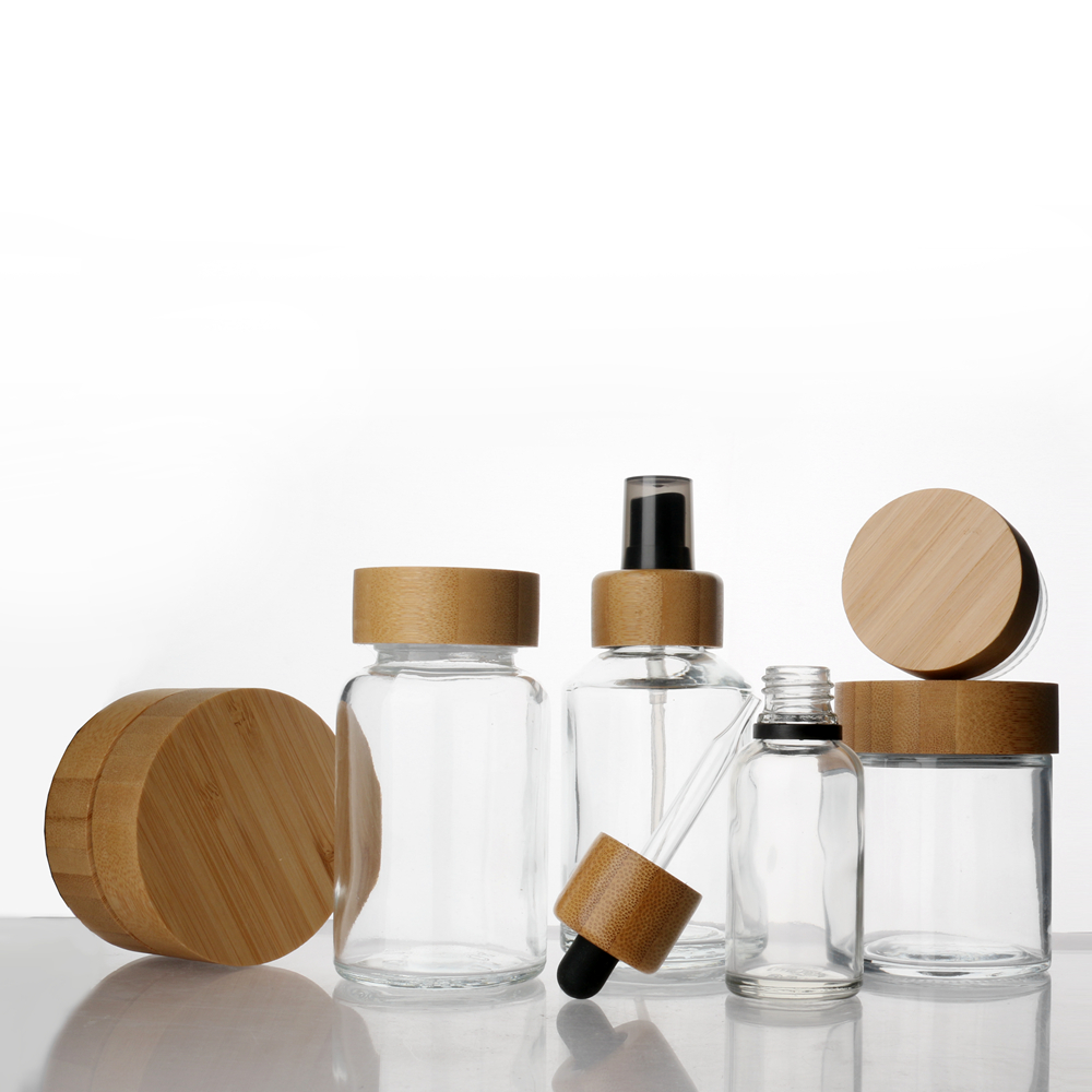 Wholesale glass Dropper Bottle essential oil bottle CBD glass bottle with bamboo lid