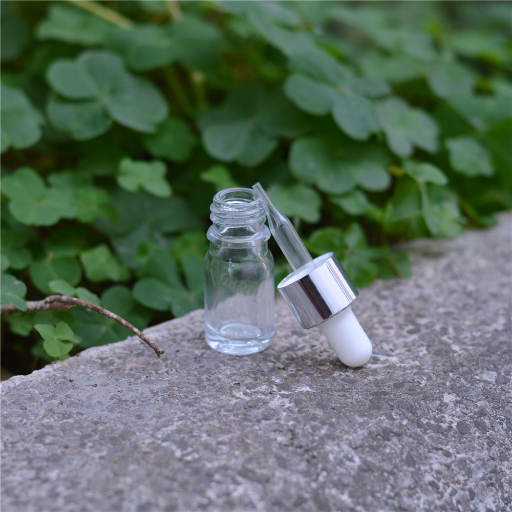 Wholesale glass dropper bottle 10ml 15ml 20ml 30ml 50ml clear amber black glass perfume essential oil bottle cosmetic bottles