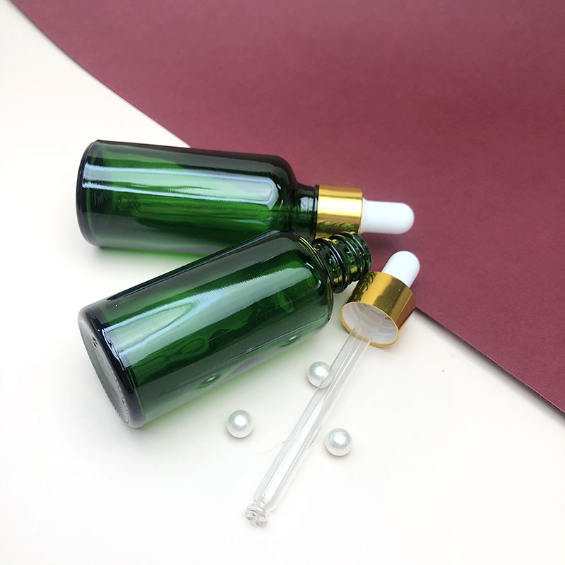 Wholesale green glass oil drop bottle private label beard oil drop ship glass bottle for essential oil